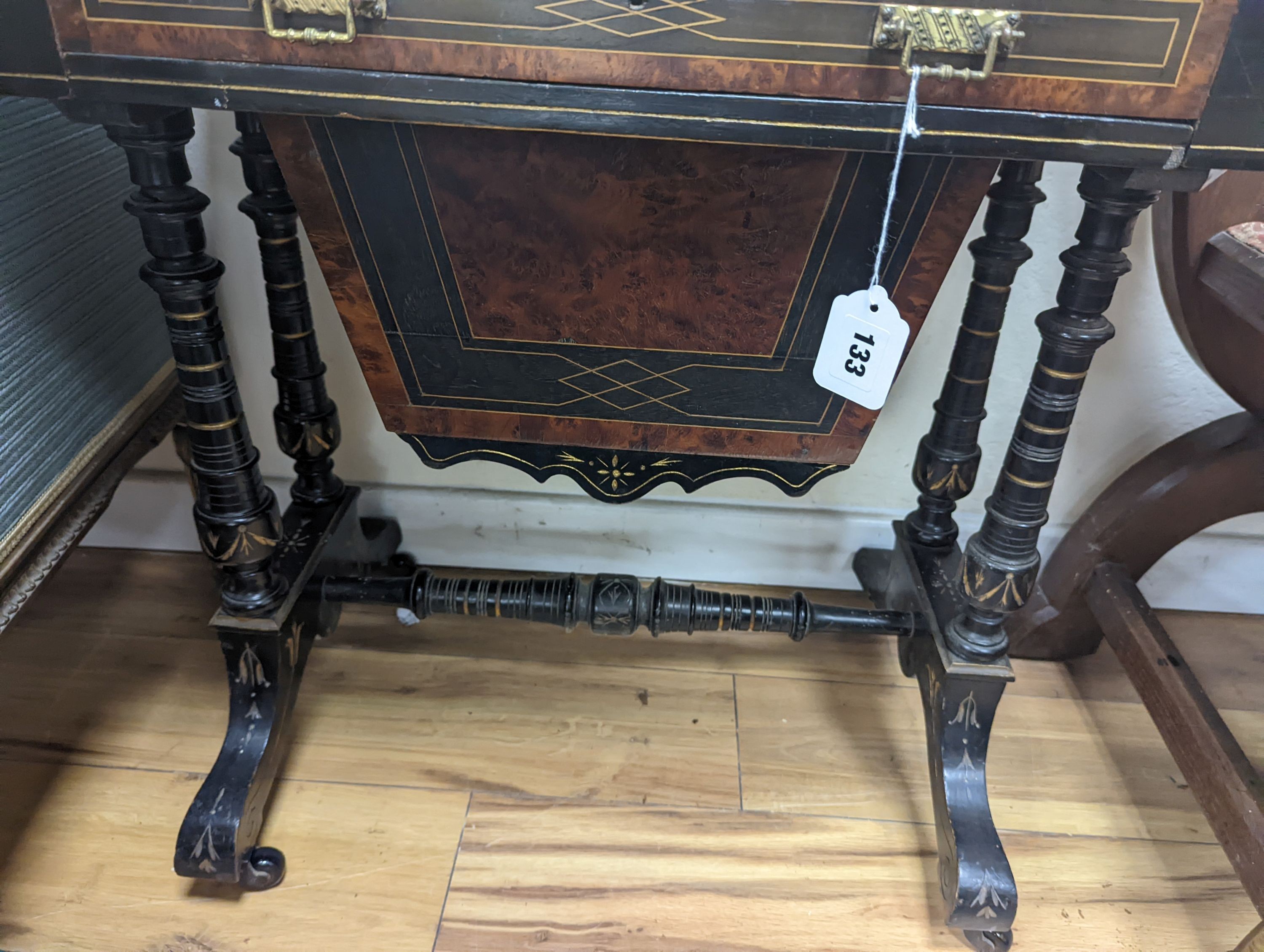 A late Victorian part ebonised bird's eye maple writing/work table, width 67cm, depth 41cm, height 69cm